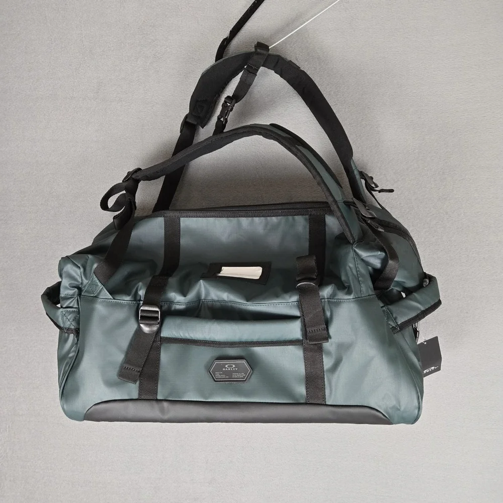 NEW $140 Oakley Road Trip RC Duffle Travel Bag 50L Green Backpack FOS901037 Gym